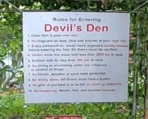 Devil's Den Florida Warning Entry Sign