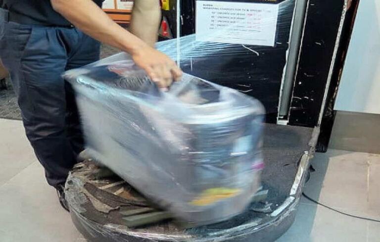 Wrapping Luggage In Plastic – What Benefits, If Any, Are There?