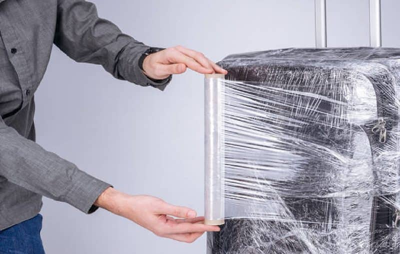 Wrapping Luggage In Plastic What Benefits, If Any, Are There?